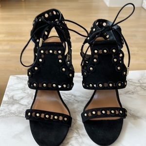 Aquazzura black velvet heels.